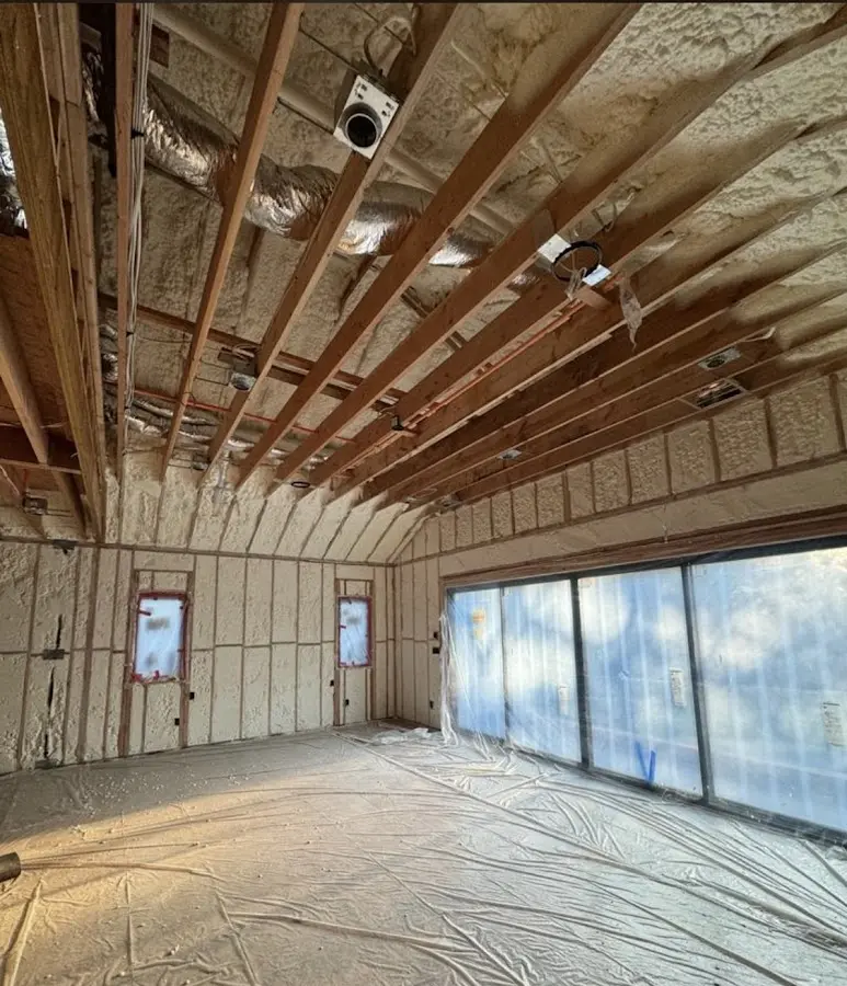 Interior walls and ceiling insulated with spray foam during new construction in Catonsville